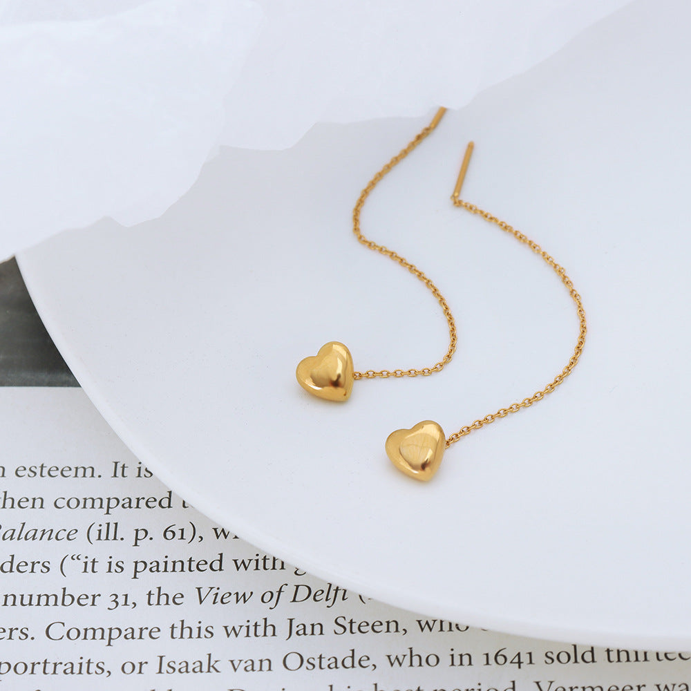 18 Karat vergoldete, exquisite, edle Herzform-Ohrringe mit Quasten-Design